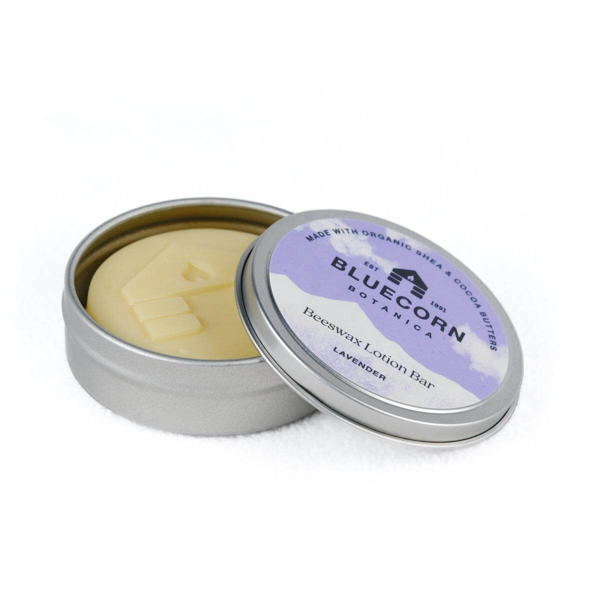 Open tin of Bluecorn Botanica Lavender Beeswax Lotion Bar