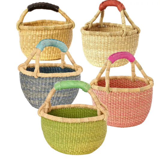 Set of colorful woven baskets with handles on a white background
