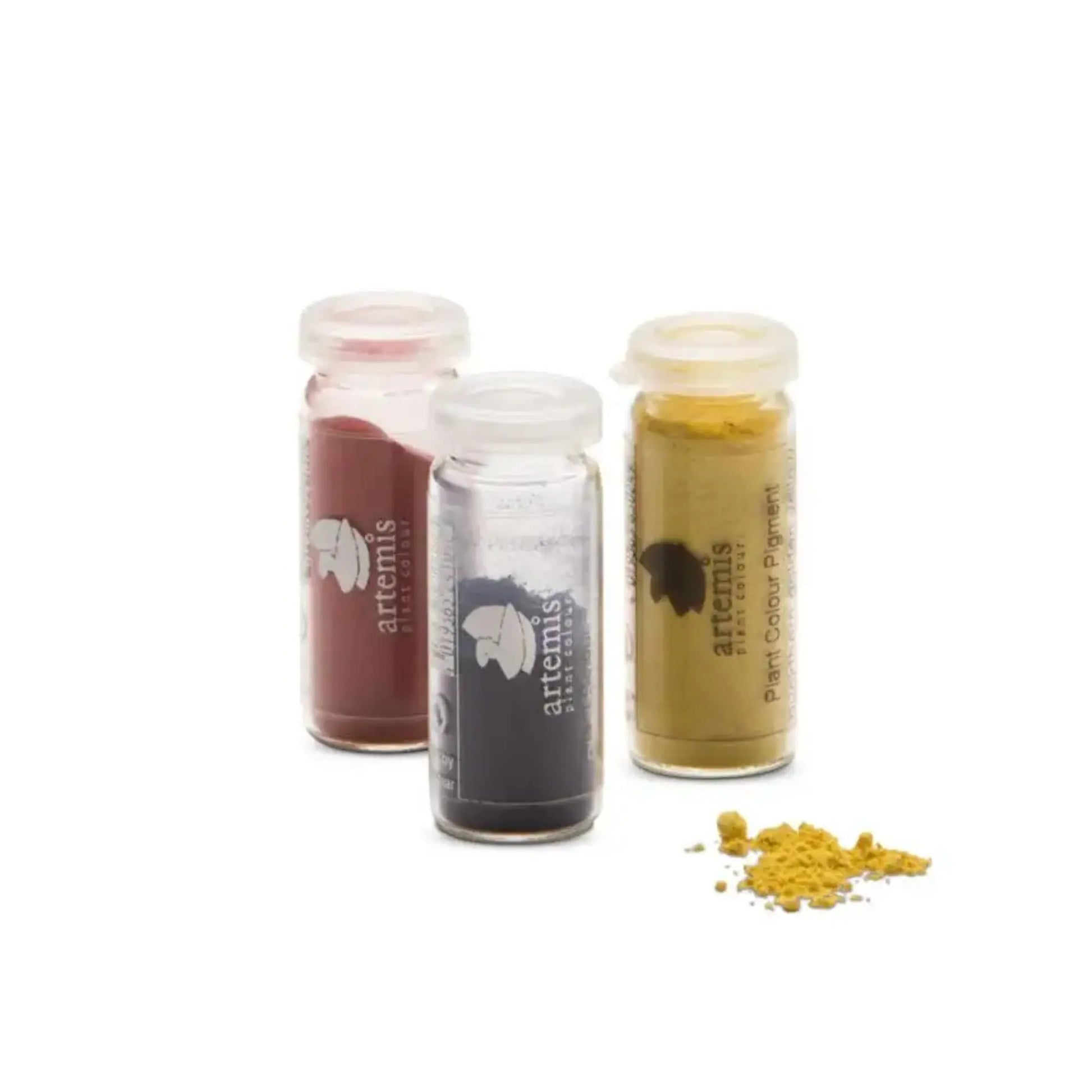 Botanical pigment powders in glass jars for handmade watercolor paint mixing