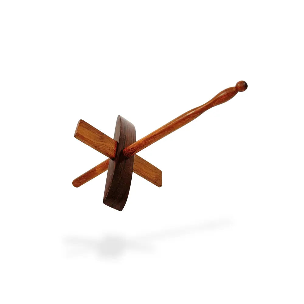 Wooden toy top on a white background