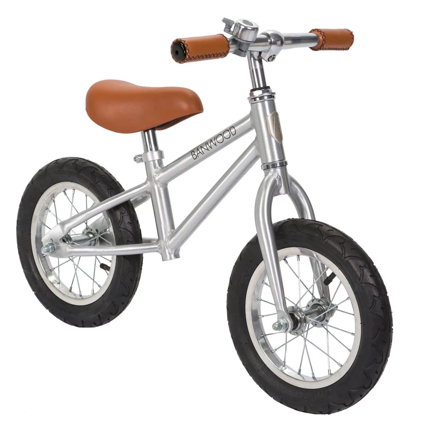 Silver balance bike with brown handlebar grips and seat on a white background