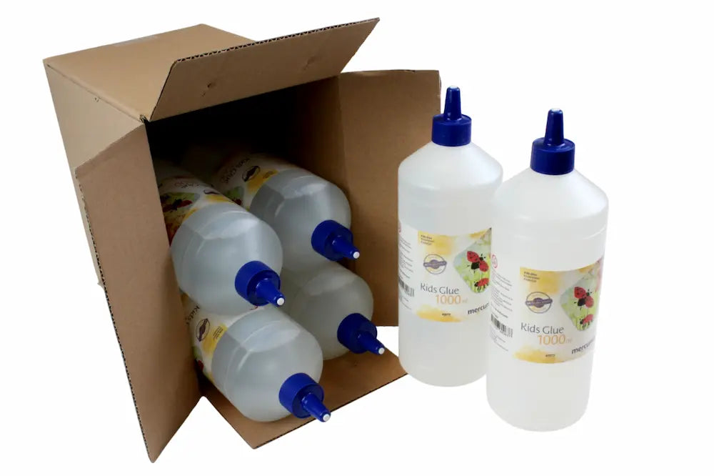 Cardboard box with large bottles of kids glue on a white background