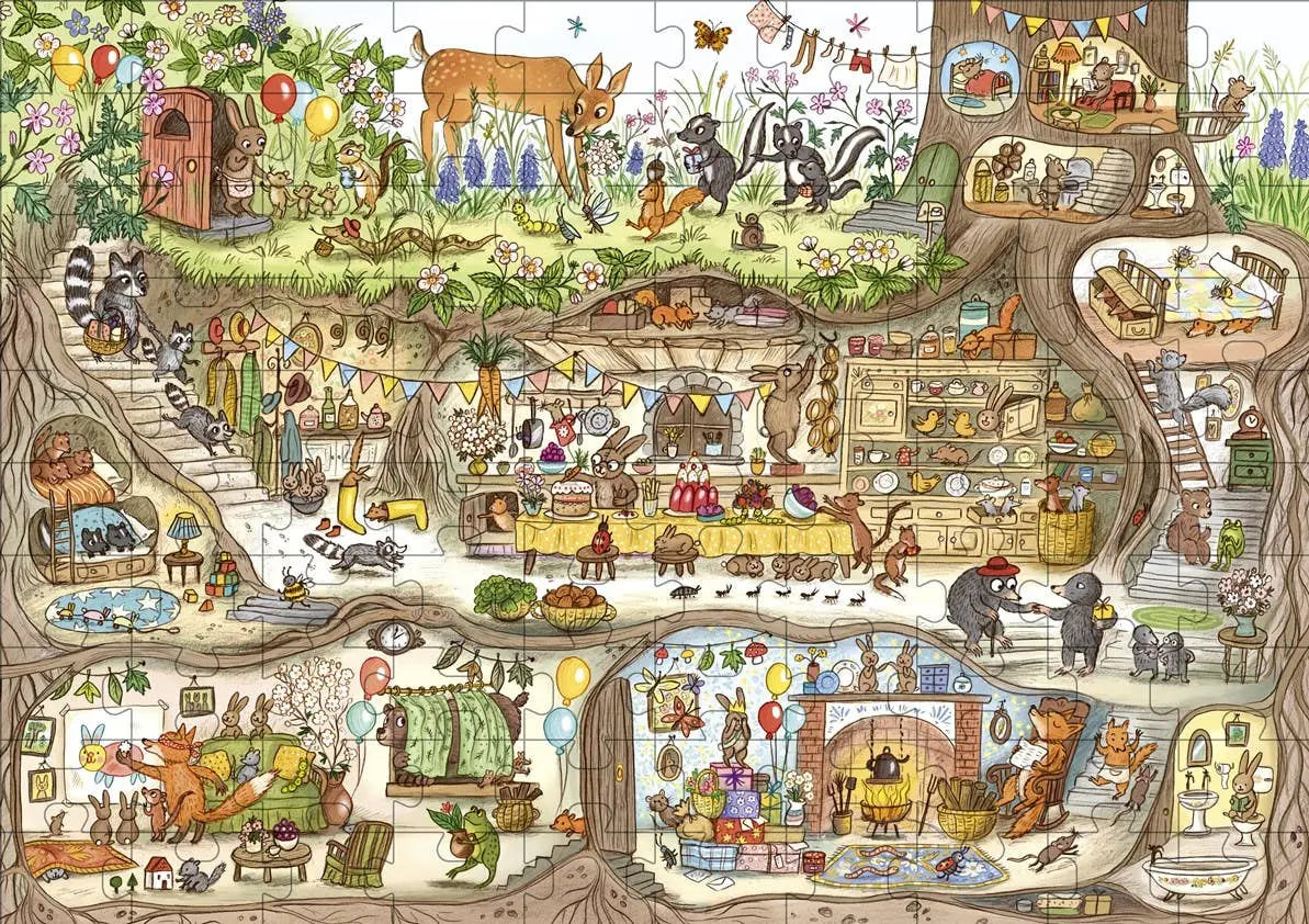 Completed Bunny's Birthday jigsaw puzzle showing woodland animals celebrating in an underground burrow and tree home, with balloons, bunting, and a birthday table.