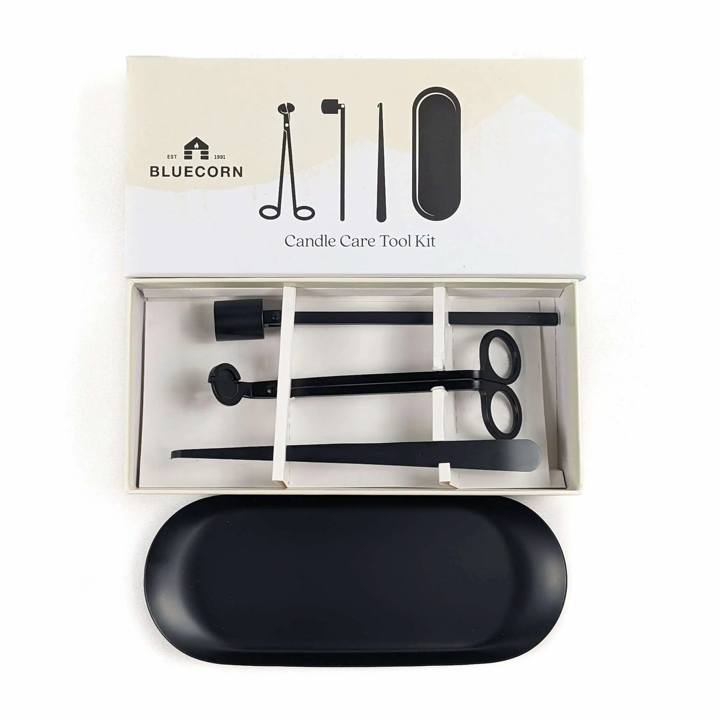 Candle care tool kit with tools and a black tray in packaging, branded as Bluecorn.