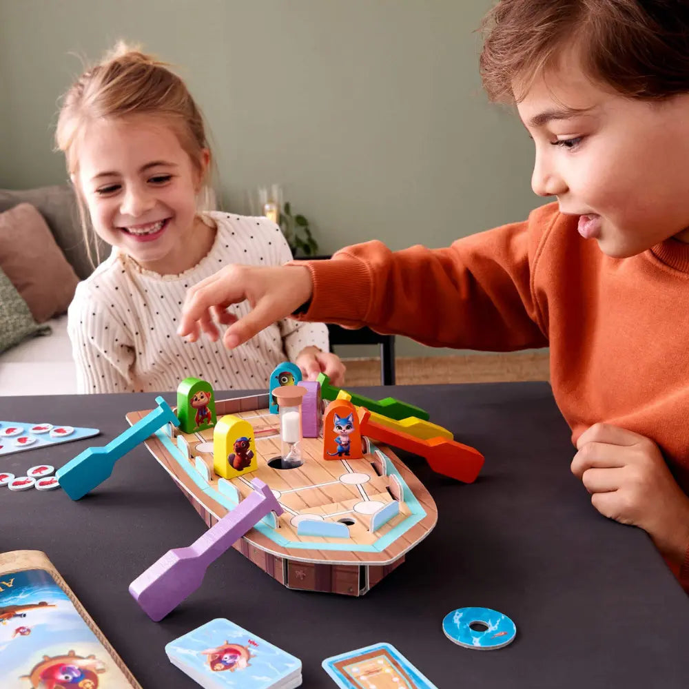 Players laughing and playing Capt’n Pepe cooperative adventure game together