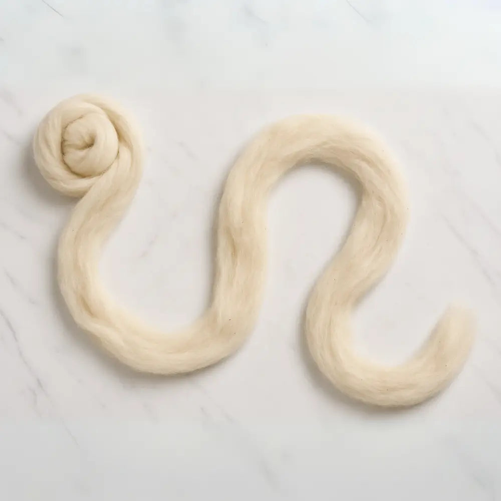 uncoiled skein of Undyed superfine Merino wool sliver fiber for spinning and felting