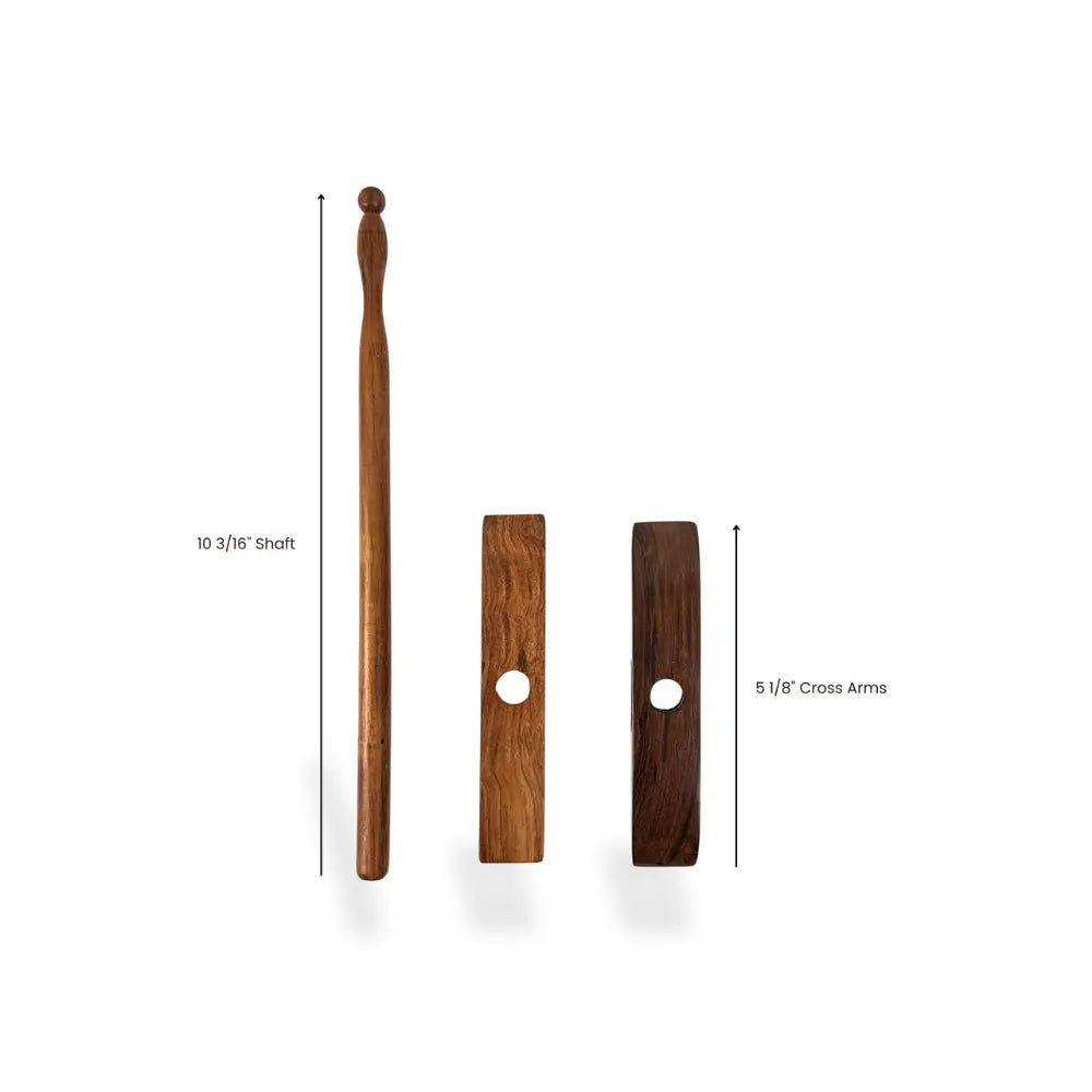 Wooden tool with measurements on a white background