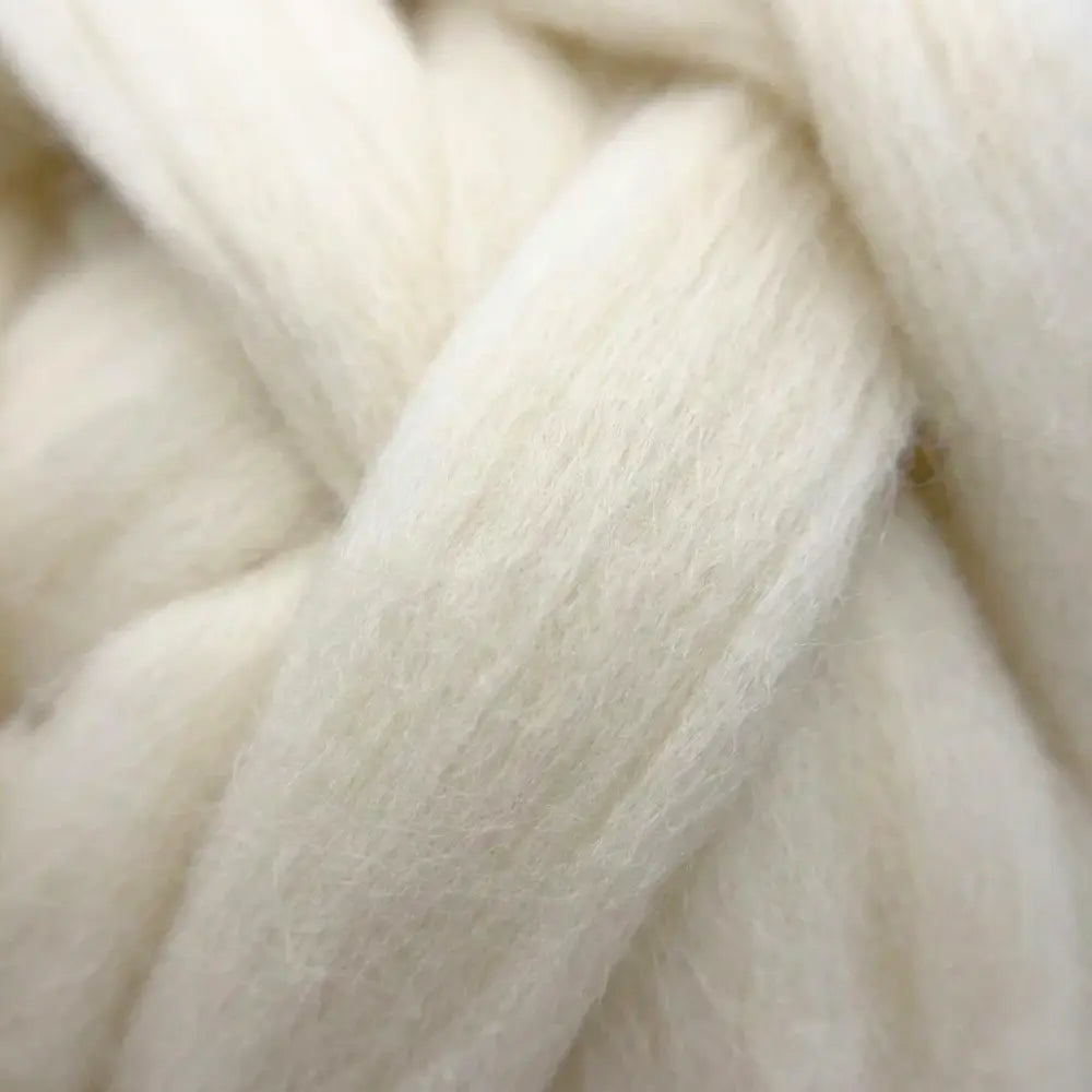 Close up of undyed Cheviot wool combed top spinning fiber natural cream