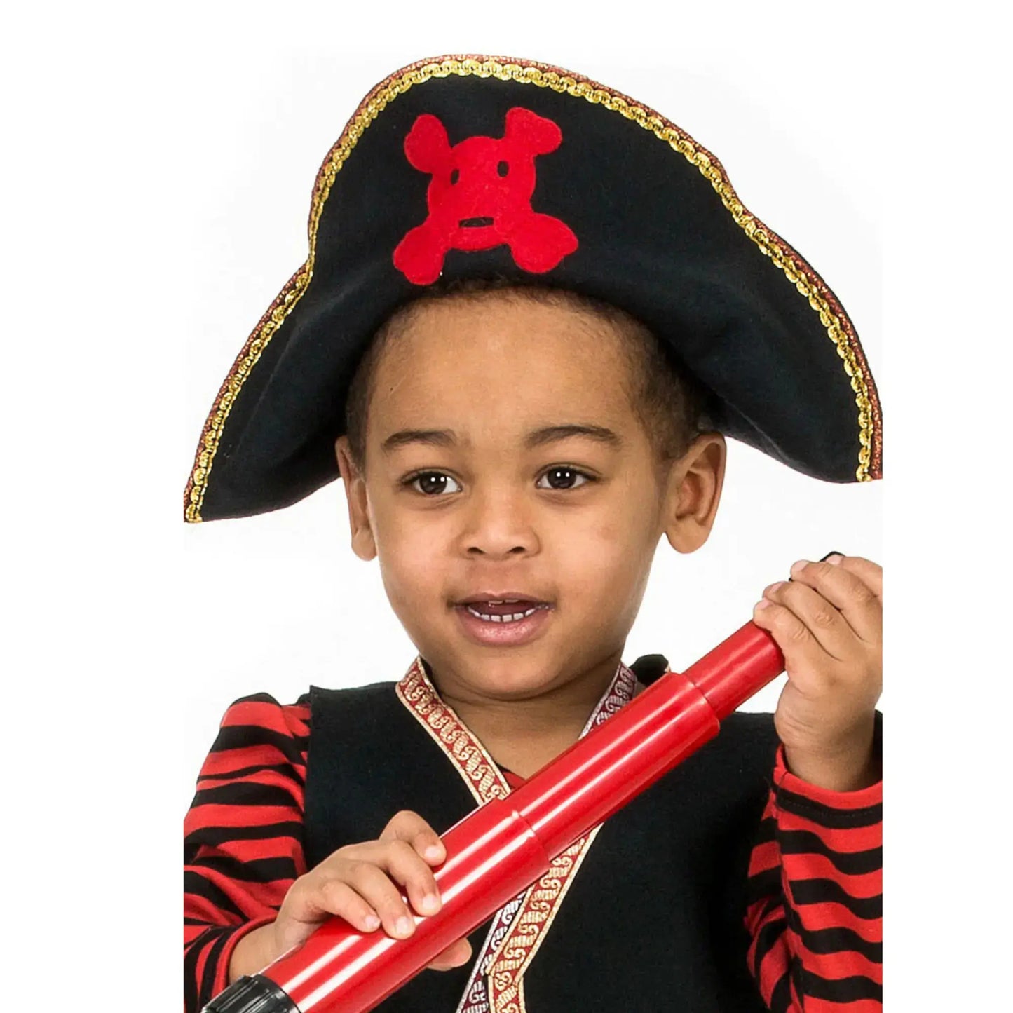 Child wearing wool pirate hat with red skull for imaginative play