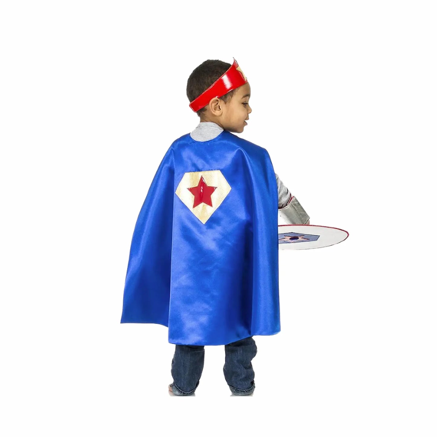 Child wearing reversible superhero cape showing blue back side for imaginative play