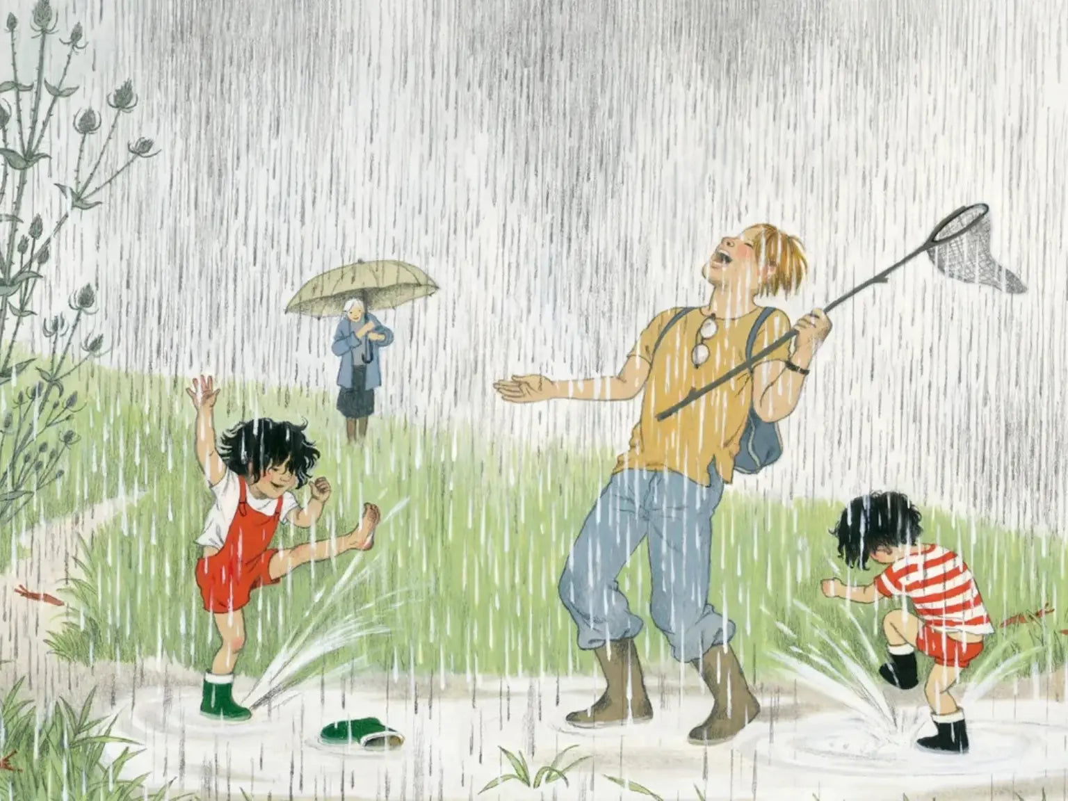 A family laughing and playing in the rain