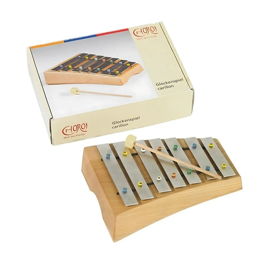 Wooden xylophone with metal bars and wooden sticks, displayed in front of its packaging.