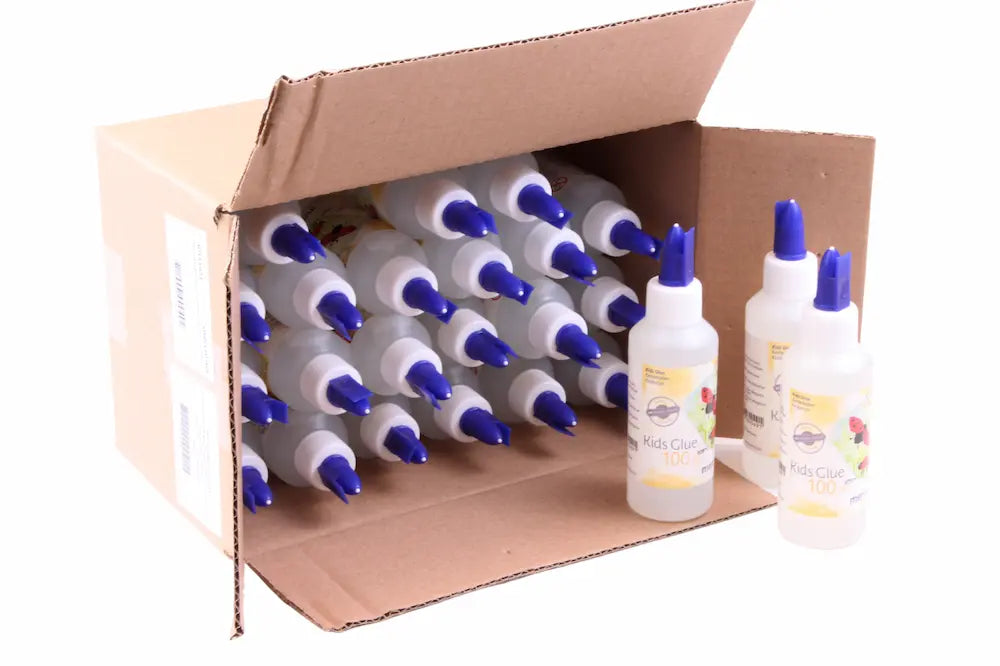 Cardboard box containing multiple bottles with blue nozzles on a white background