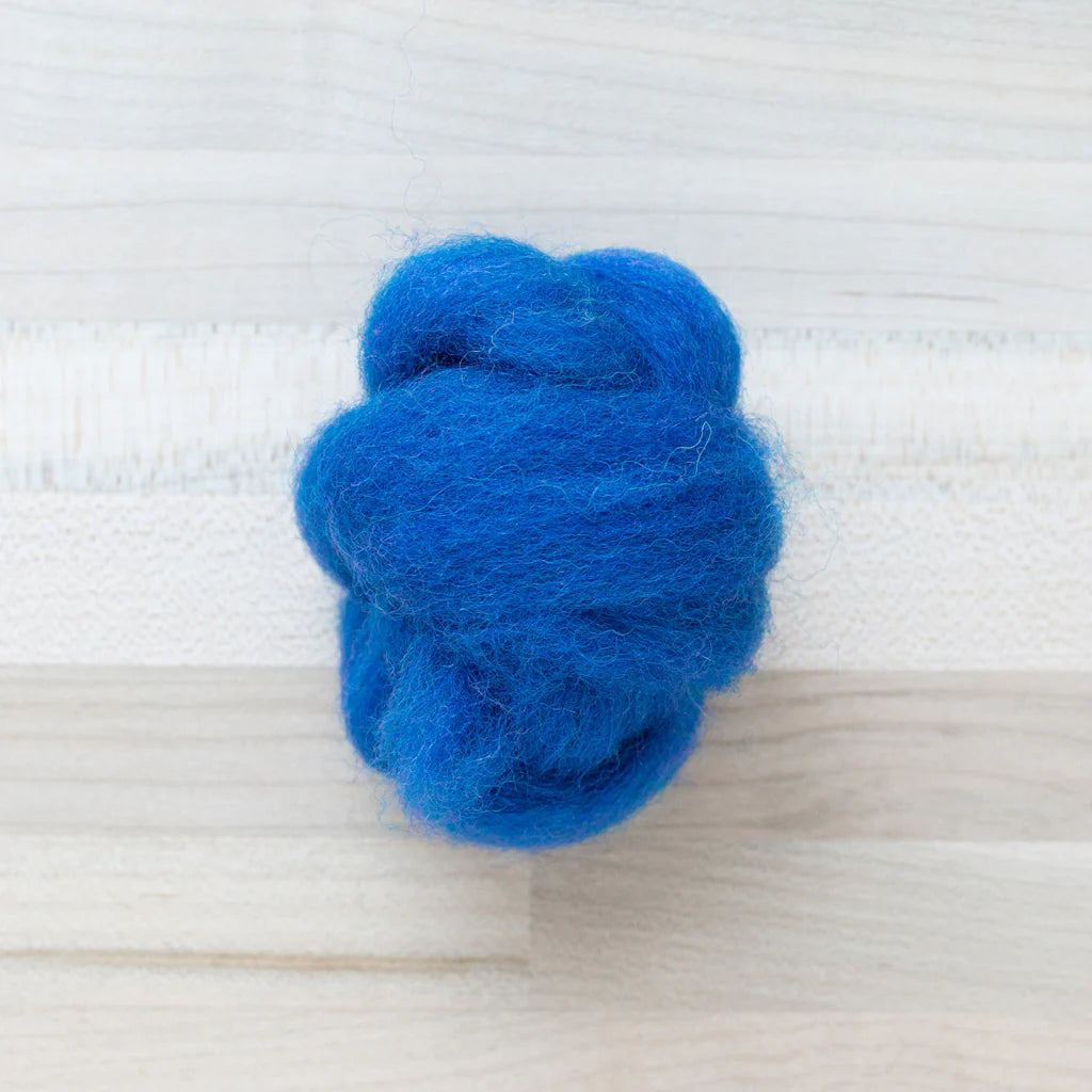 Cobalt Blue Wool Roving Felter's Flowing on tabletop