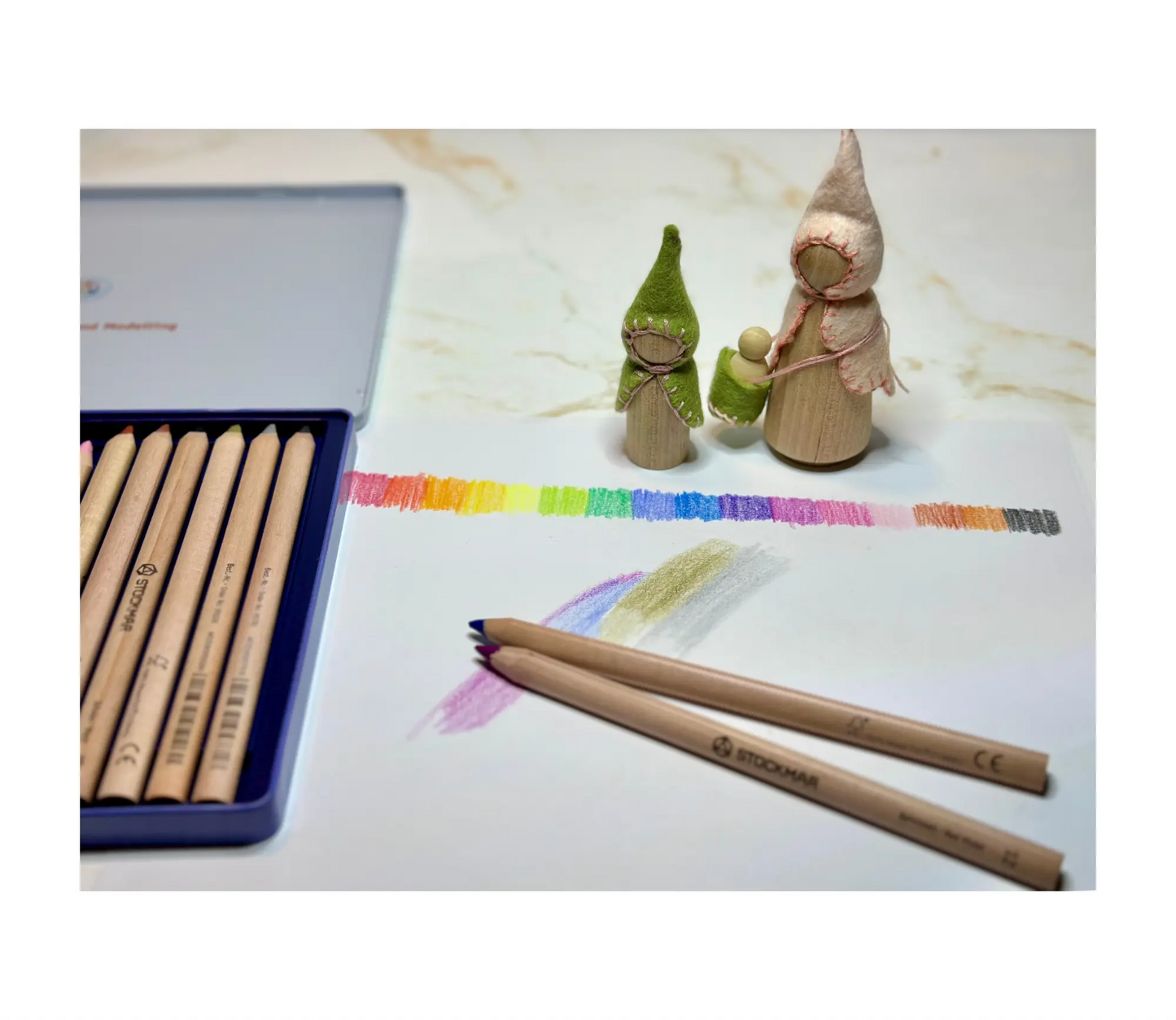 Triangular colored pencils used for drawing and color blending on paper