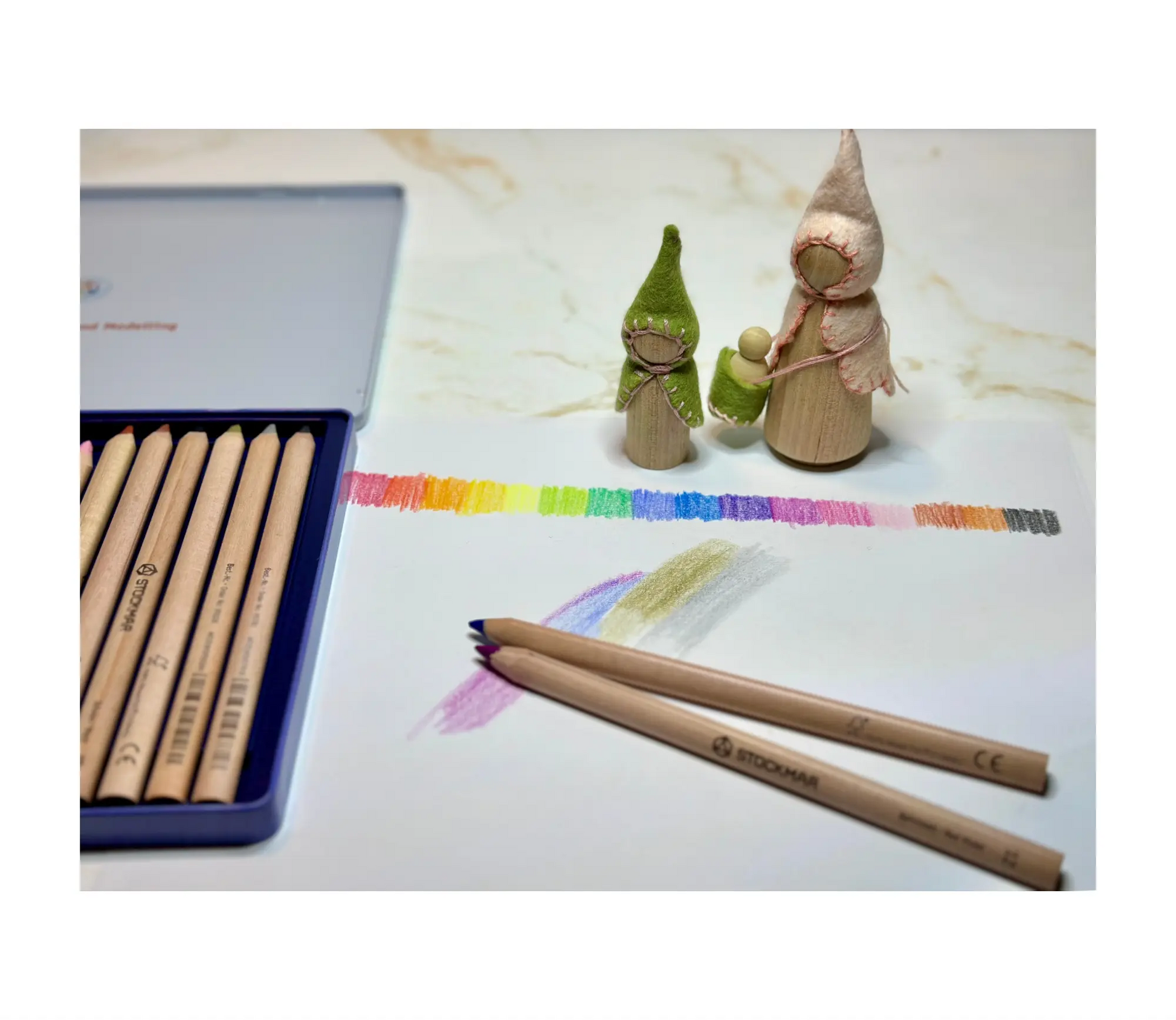 Triangular colored pencils used for drawing and color blending on paper