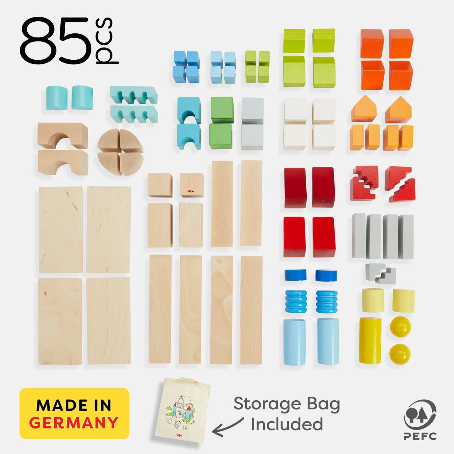 Set of colorful wooden building blocks with storage bag included on a white background