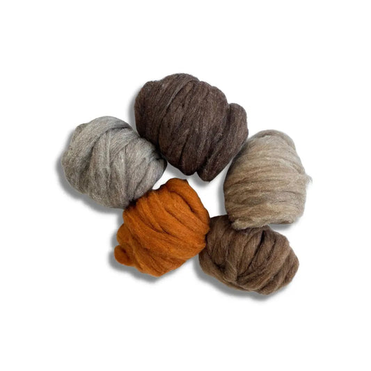 Set of brown and gray natural wool rovings slivers for needle felting on white background
