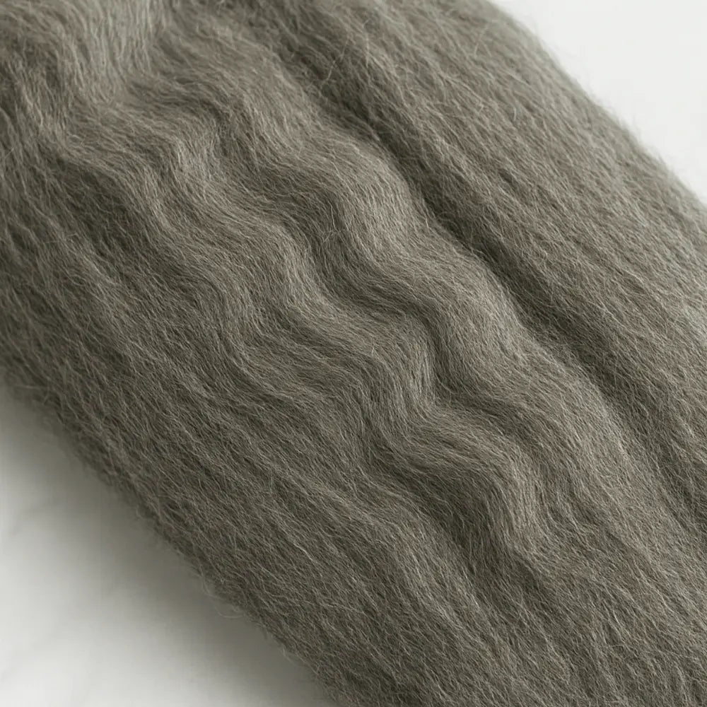 Natural gray Corriedale wool combed top spinning and felting fiber closeup