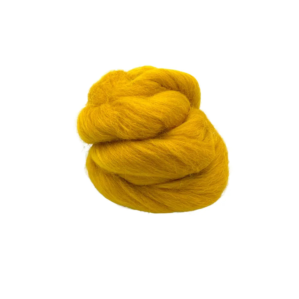 Mustard Corriedale wool spinning fiber on a white background