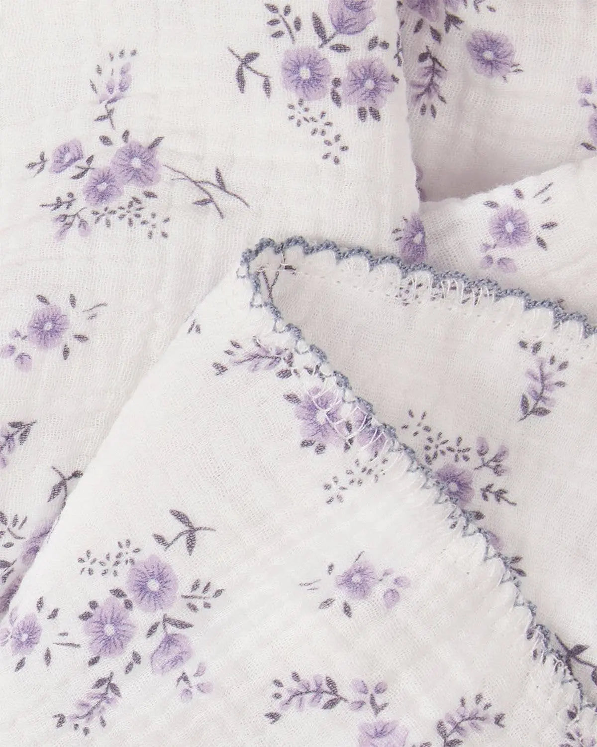 Close up of cotton and linen floral fabric used for rag doll dress