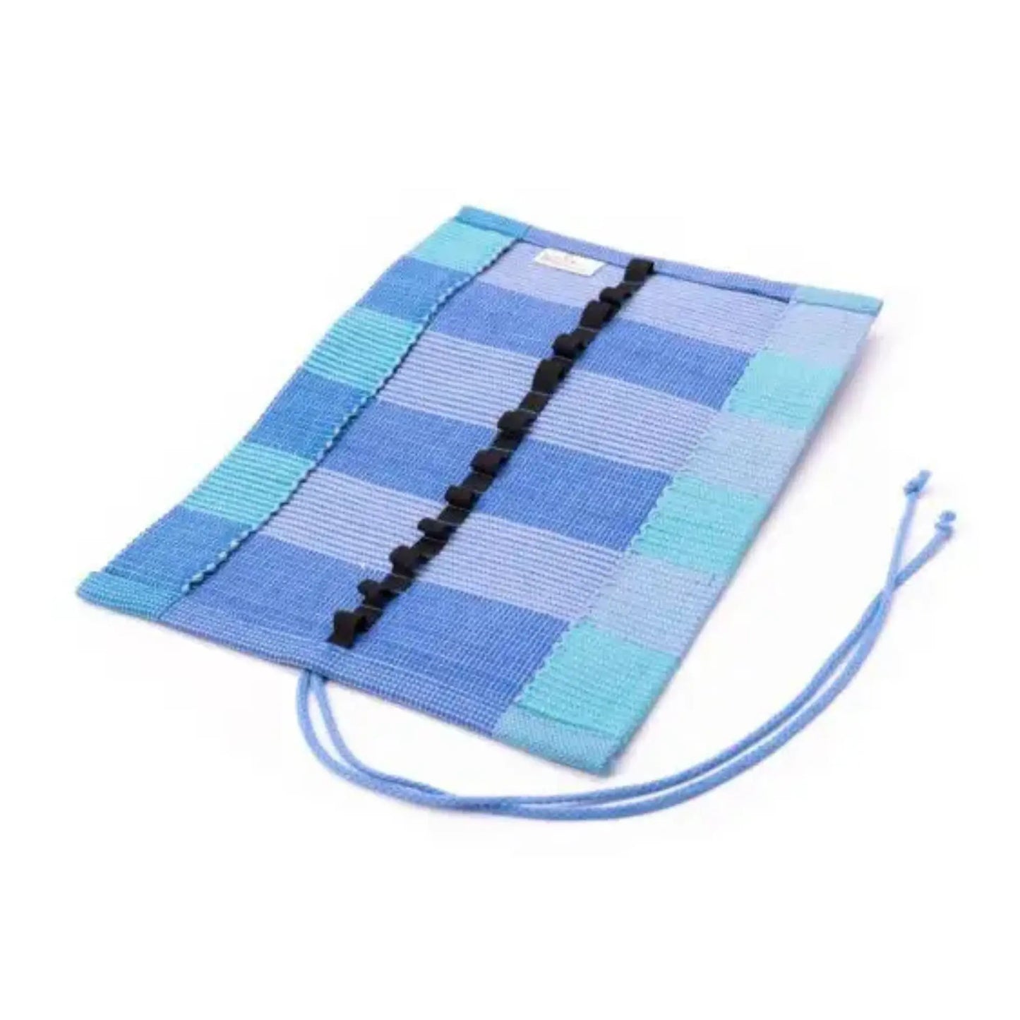 Blue woven crayon roll for block and stick crayons on a white background