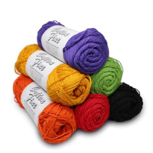Set of colorful Brown Sheep Yarn cotton and merino skeins with labels on a white background
