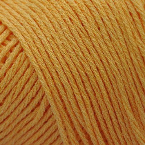 Brown Sheep Cotton Fine fingering weight yarn in sunflower gold