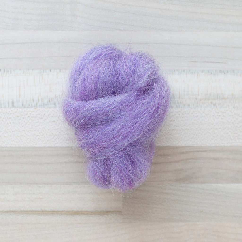 Crocus Purple Wool Roving Felter's Flowing on tabletop