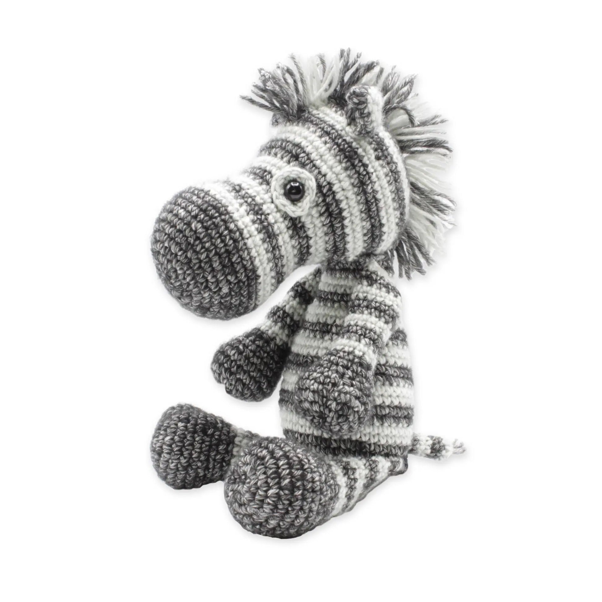 Finished cuddly zebra stuffed animal made from a crochet kit