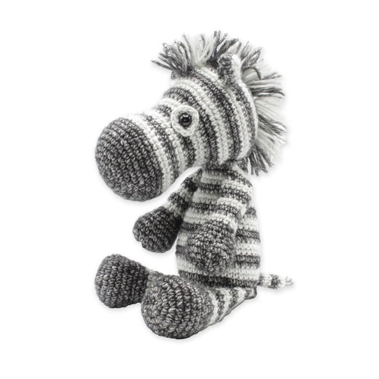 Finished cuddly zebra stuffed animal made from a crochet kit