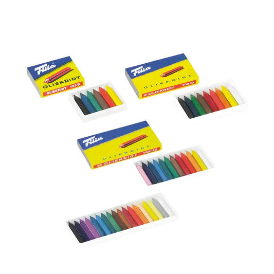 Set of colorful hard oil crayons in open boxes on a white background