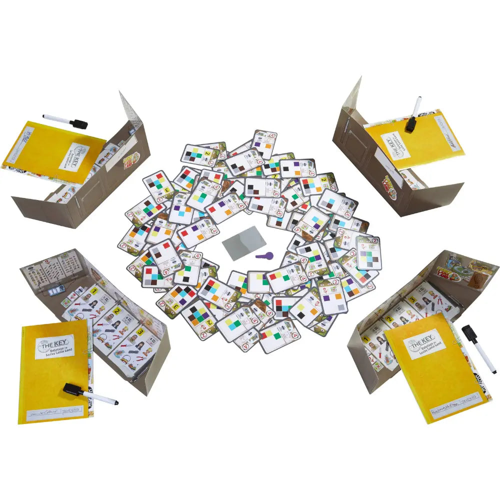 The Key Lucky Llama Land deduction mystery game components laid out on table