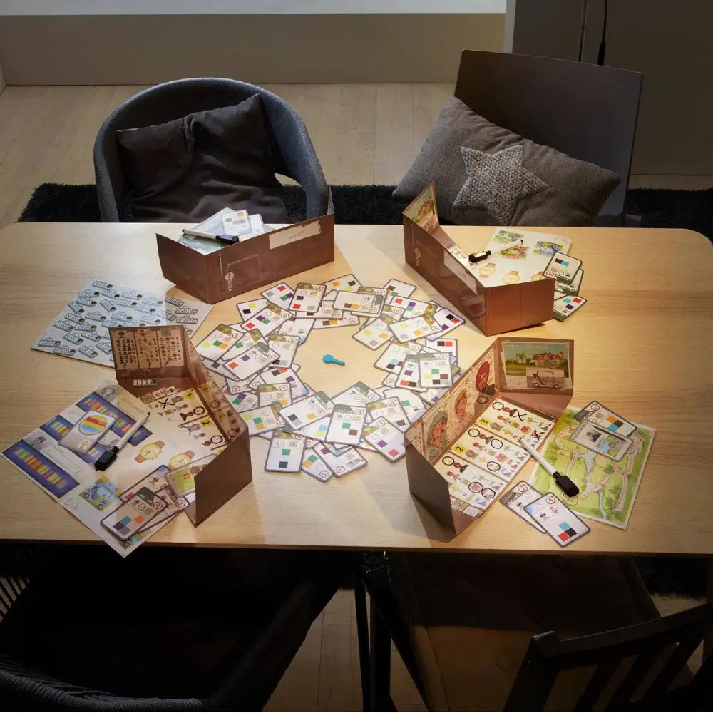 The Key Oakdale Club deduction mystery game set up for four players on table