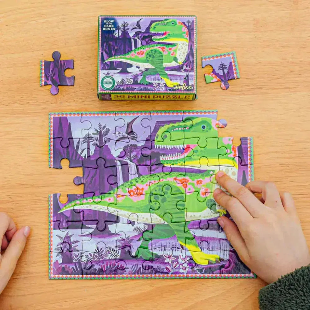 eeBoo T-Rex 36 piece mini dinosaur puzzle shown partly completed with box and loose pieces