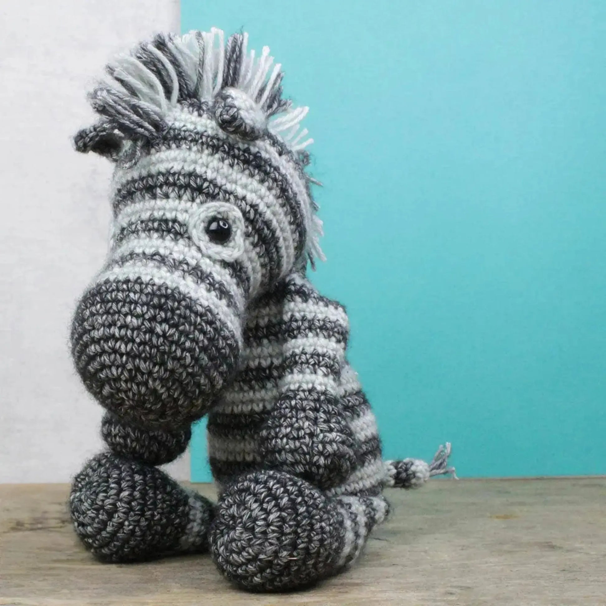 Finished crocheted zebra stuffed animal from a DIY crochet kit