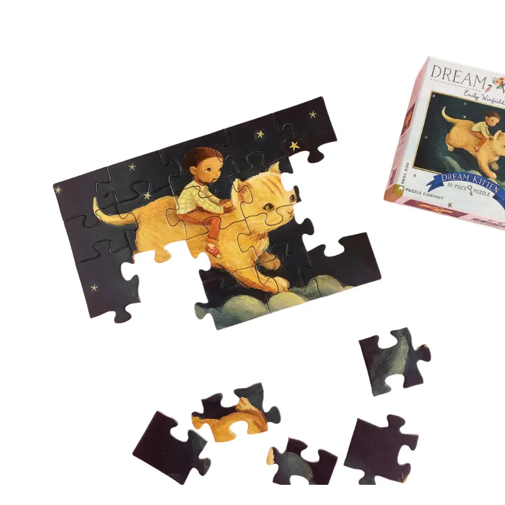 Jigsaw puzzle with a child and cat design, partially completed, next to the packaging.