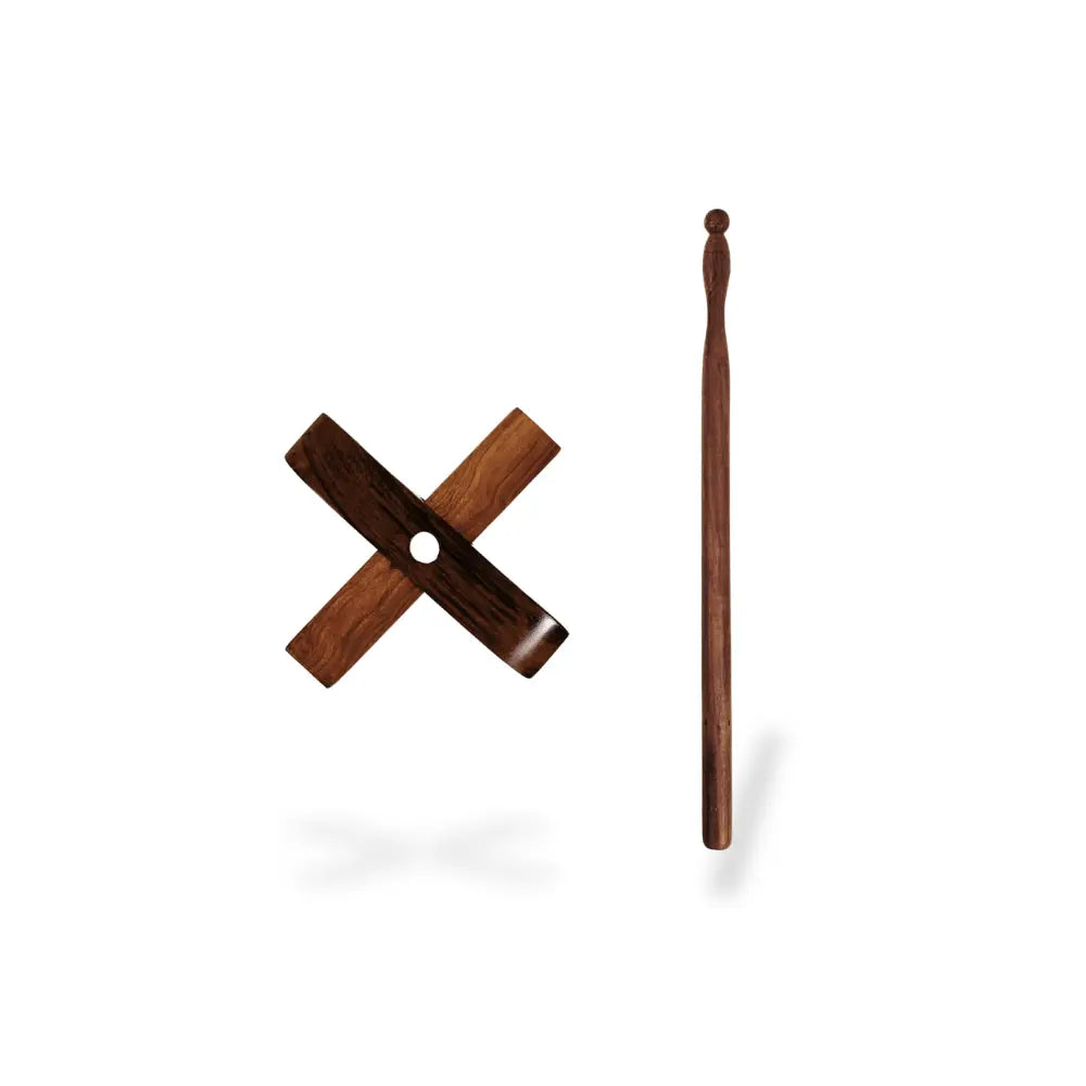 Wooden crossbar and stick on a white background