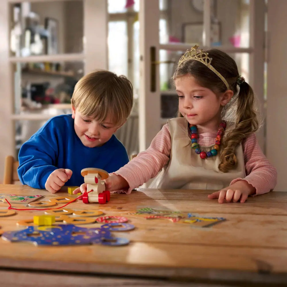 Toddler and preschooler playing The Duck Game matching game together