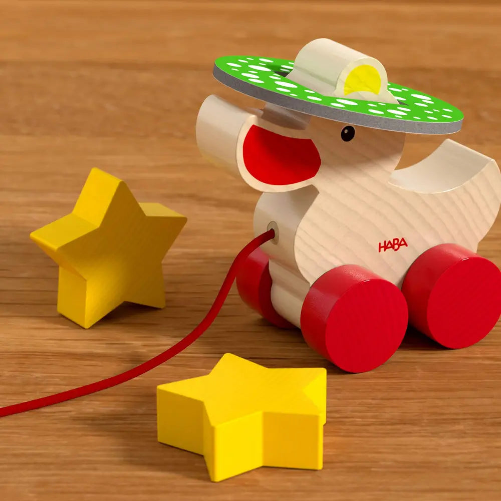 Close-up of wooden duck piece from The Duck Game for toddlers
