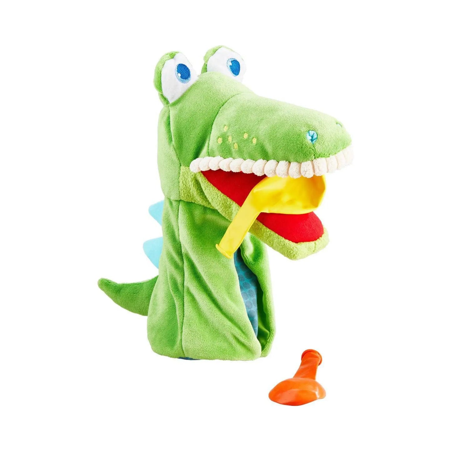 Green crocodile glove puppet with a red tongue on a white background