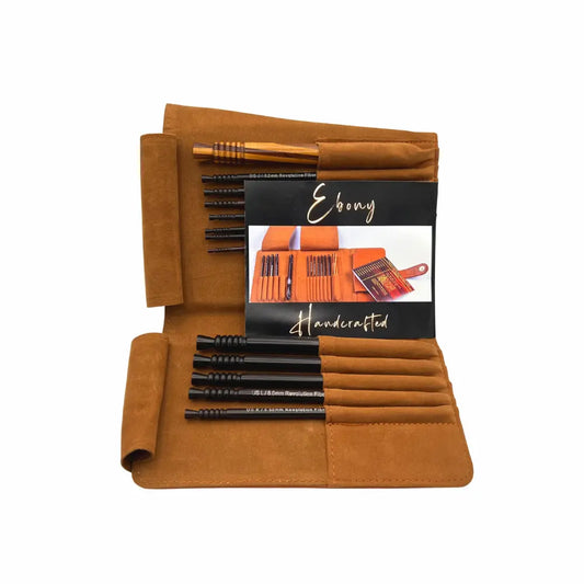 Set of black ebony crochet needles in a brown case with 'Ebony' branding on a white background