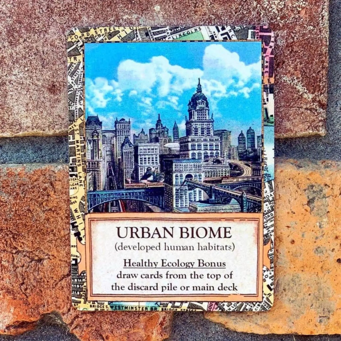 Urban biome card from Ecologies Bizarre Biomes showing a developed human habitat