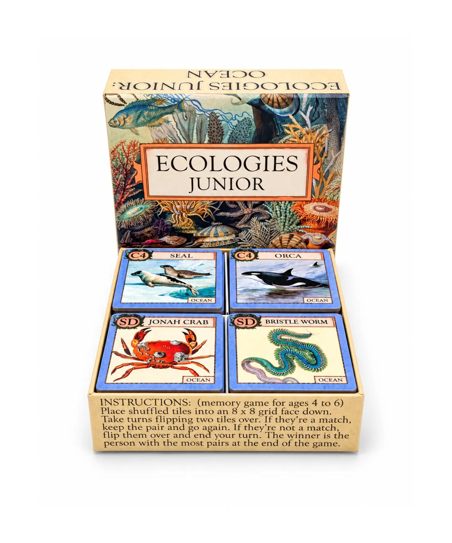 Ecologies Junior: Ocean open box with illustrated ocean tiles visible, including seal, orca, Jonah crab, and bristle worm