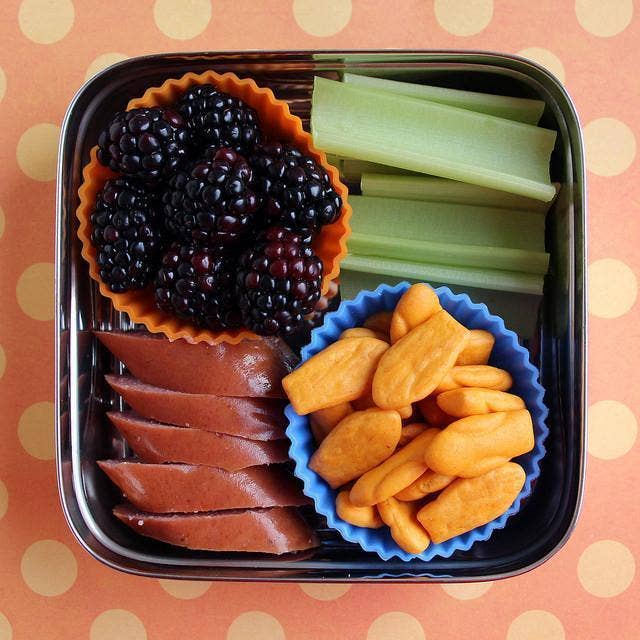 ECOlunchbox Solo Cube packed with berries, vegetables, and lunch foods