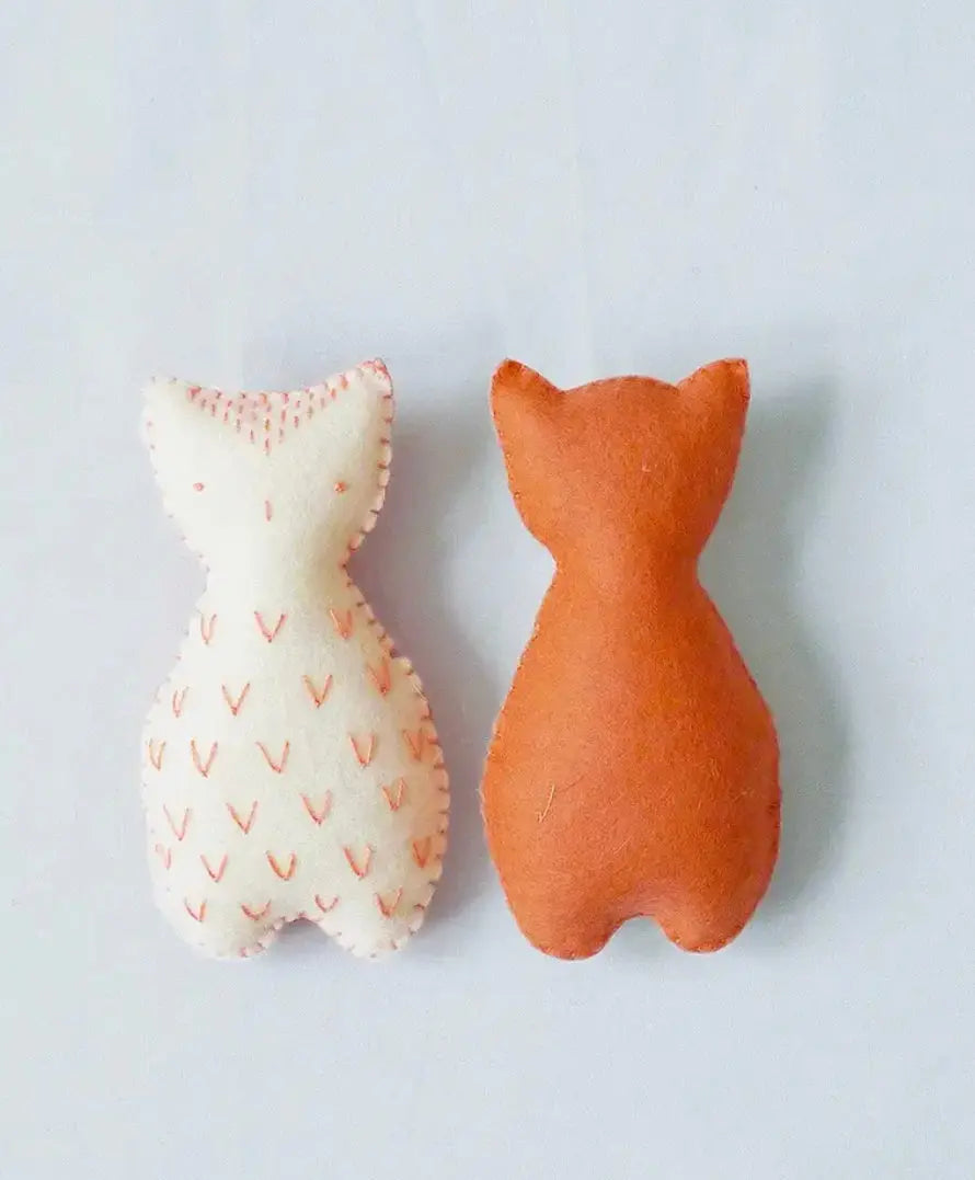 two beginner embroidery owls in coral and white