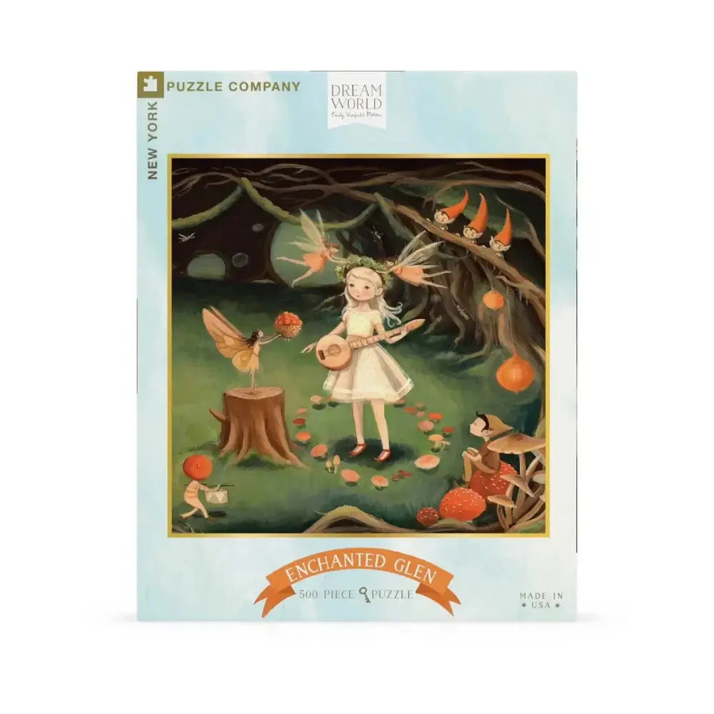 Jigsaw puzzle packaging with a fairy and nature-themed design on a light blue background