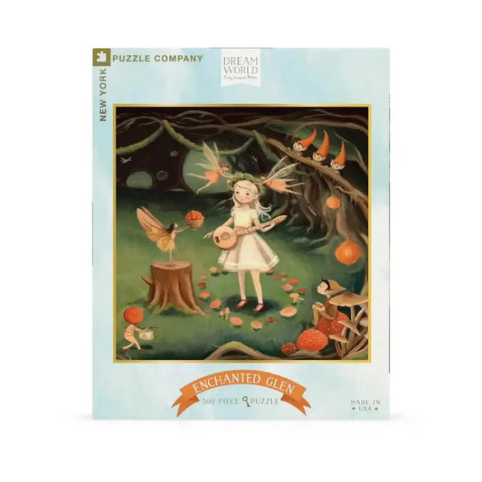 Jigsaw puzzle packaging with a fairy and nature-themed design on a light blue background