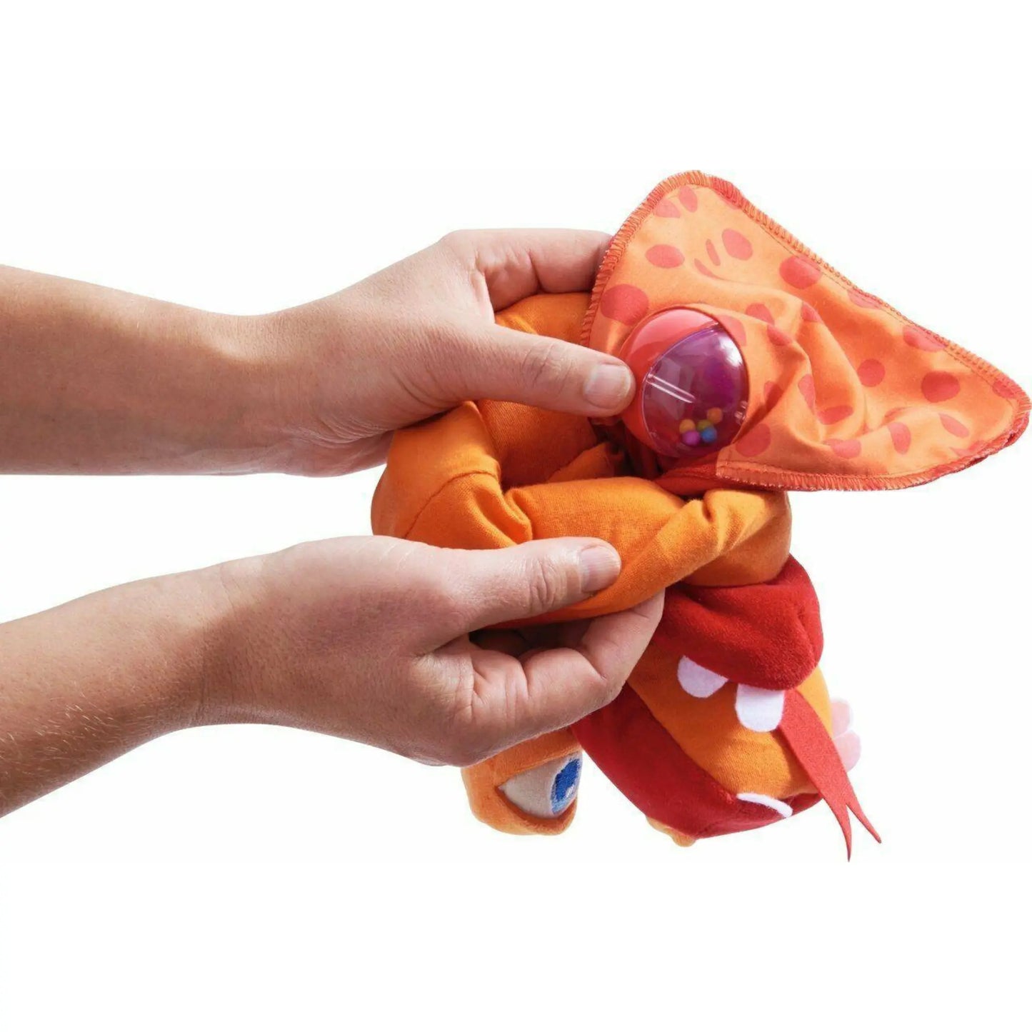 Person showing the magic pocket in the dragon hand puppet to show where things go the dragon eats