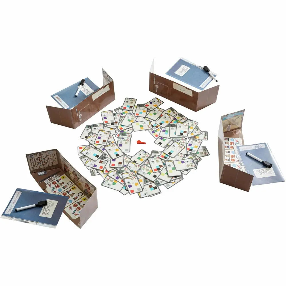 Board game components including cards, dice, and boxes on a white background